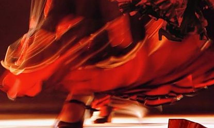 A red skirt spinning in motion blur
